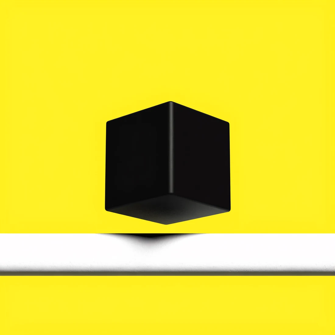 A black cube resting above a white bar